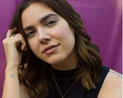 She is a tattoo lover and has tattoos on her wrist and shoulder.